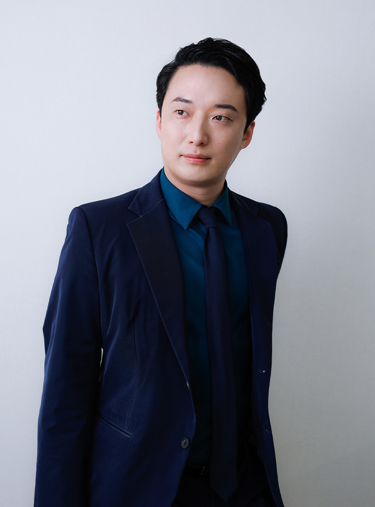 小西 崇文